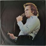 Neil Diamond "Love At The Greek Recorded Live At The Greek Theatre" (CBS 95001) Schutzhülle Vorderseite Neil Diamond "Love At The Greek Recorded Live At The Greek Theatre" (CBS 95001) Schutzhülle Vorderseite