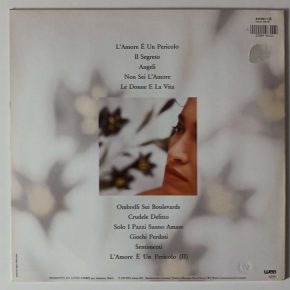 Grazia di Michele - "L'Amore È Un Pericolo" (WEA – 244 631-1) Cover Rückseite